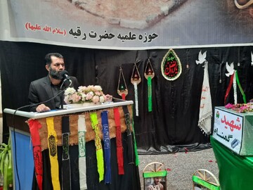 تصاویر / وداع با پیکر مطهر شهید گمنام در مدرسه علمیه خواهران برازجان