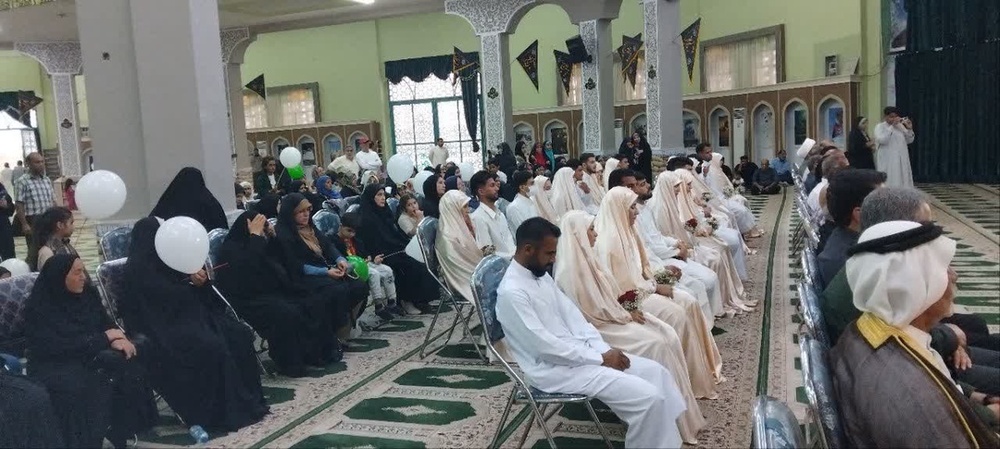 جشن ازدواج ۱۴ زوج جوان با عطر شهدا در شلمچه +تصاویر