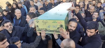 تصاویر/ مراسم تشییع و تدفین پیکر مطهر شهید گمنام در مدرسه علمیه خواهران حضرت آمنه(س) قم