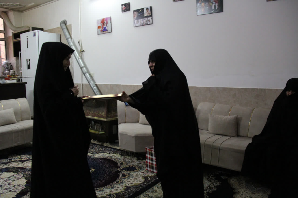 دیدار کادر مدیریت استان قم با خانواده شهدا